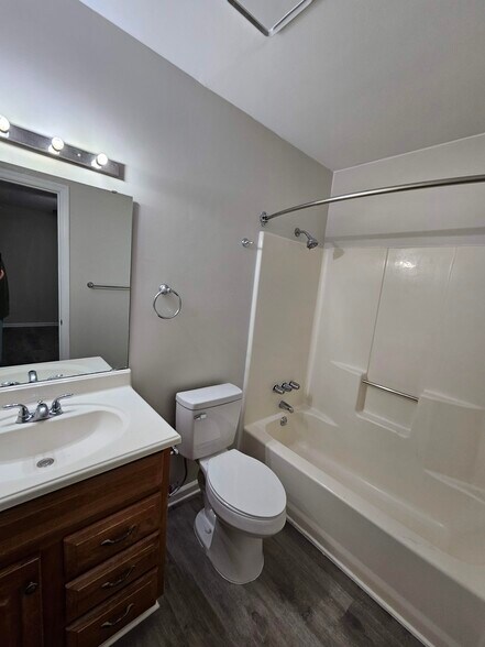 Master bathroom. - 102 Village Ct