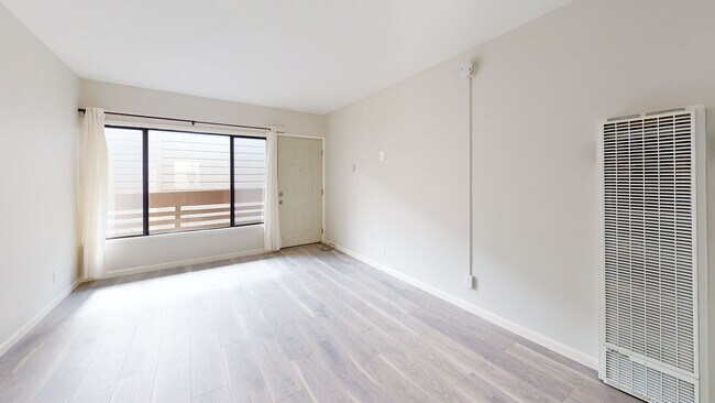 Building Photo - Remodeled modern 1 bedroom end unit, close...