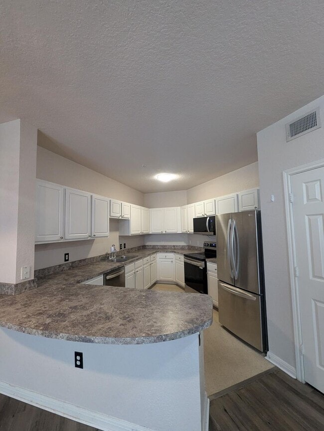 Building Photo - Must see! First floor, updates throughout!...