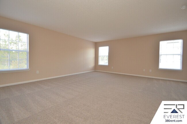 Building Photo - SPACIOUS, FULLY FENCED 4/2.5/2 IN DESIRABLE MATANZAS WOODS