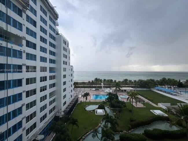 Building Photo - 5005 Collins Ave