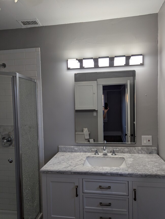 Front bathroom with shower - 3320 Herman Ave