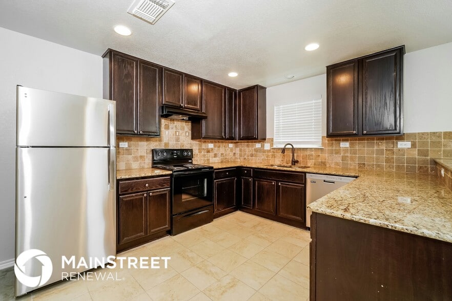 Building Photo - 7435 Bluebonnet Bay