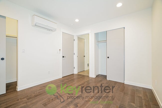 Building Photo - Rooftop Living with Open Concept Design and Parking Included