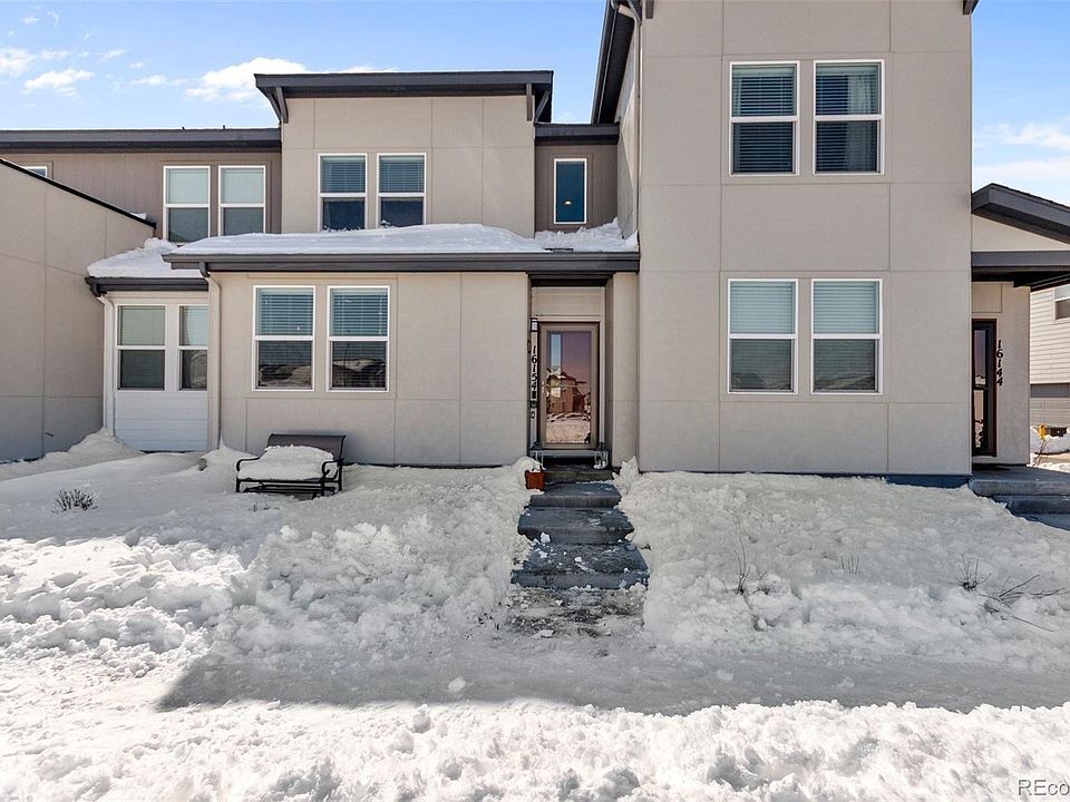 Front entrance (over looking green area) - 16154 E 47th Dr