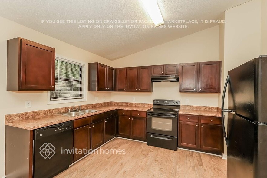 Building Photo - 6712 Songwood Dr