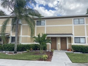 Building Photo - 413 Palm Cir E