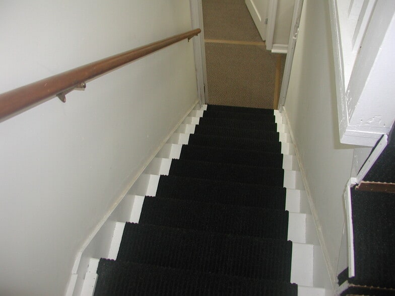 Stairs going to main floor - 241 E Ronning Ave