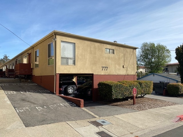 Carport area with laundry in it - 777 Mill St