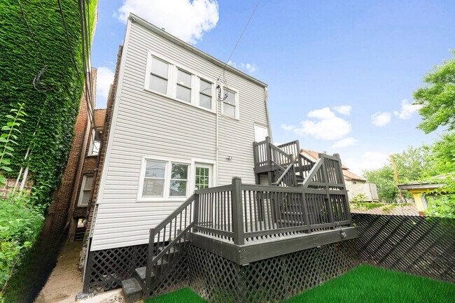 Building Photo - 6923 S Vernon Ave