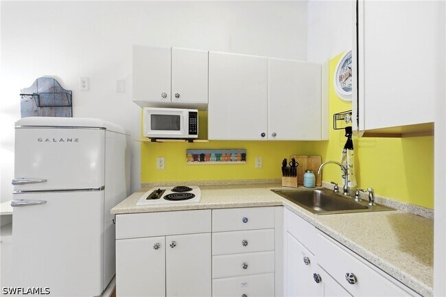 Building Photo - 25000 Tamiami Trl E