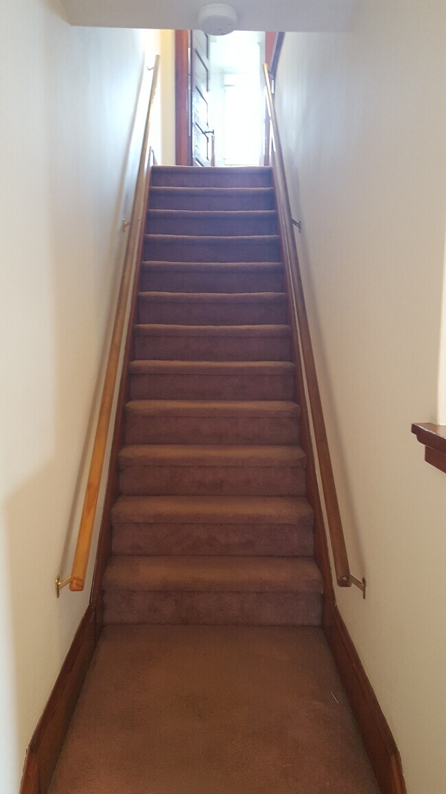 Stairs from Living Room to Second Floor (before new flooring) - 59 Park Ave