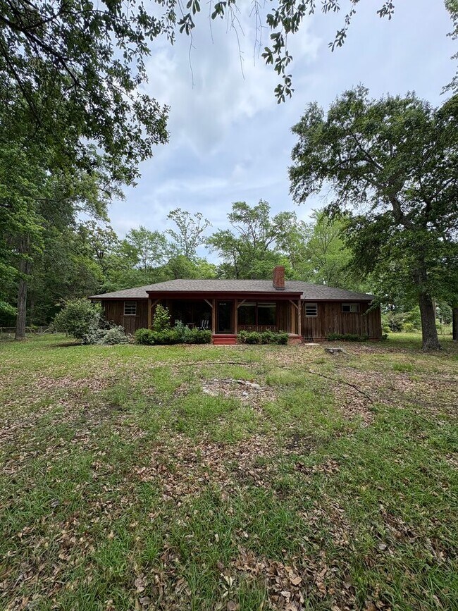 Building Photo - Storybook Cedar Home Down a Private Tree-Lined Drive
