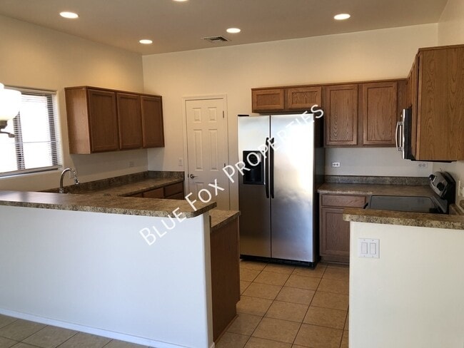 Building Photo - 7651 E Majestic Palm Ln