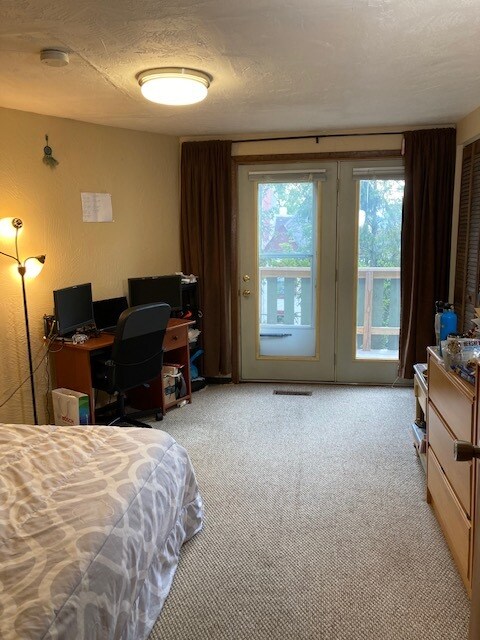 Bedroom #2 with entrance to balcony - 721 Ivy St