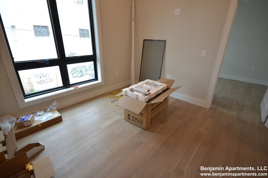 Building Photo - 16-18 Highgate St. Unit 102