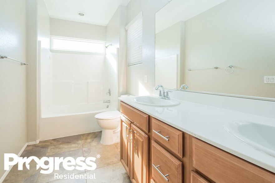 Building Photo - 9333 Flowering Tulip Ave