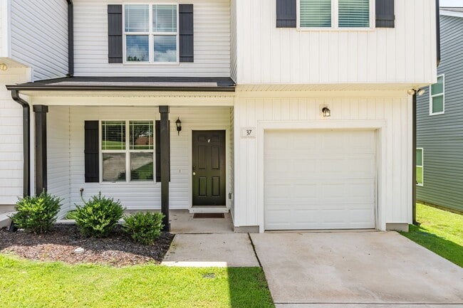 Building Photo - Modern 4 Bedroom Home in Quiet Clayton Nei...
