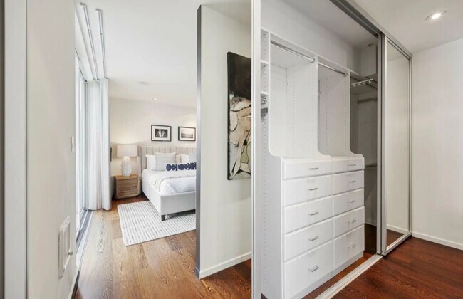 Building Photo - One-of-a-Kind Sophisticated Top-Floor Cond...