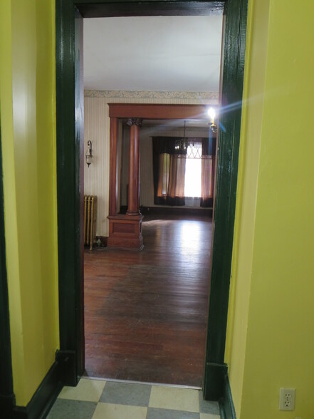 Kitchen looking into Dining and Living Rooms. - 204 S 6th St