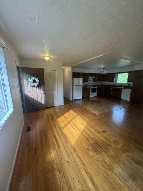 Building Photo - ½ Off First Full Month with Move-In by 8/15 • Large Yard & Deck • August App Fee Only $32. Pet-fr...