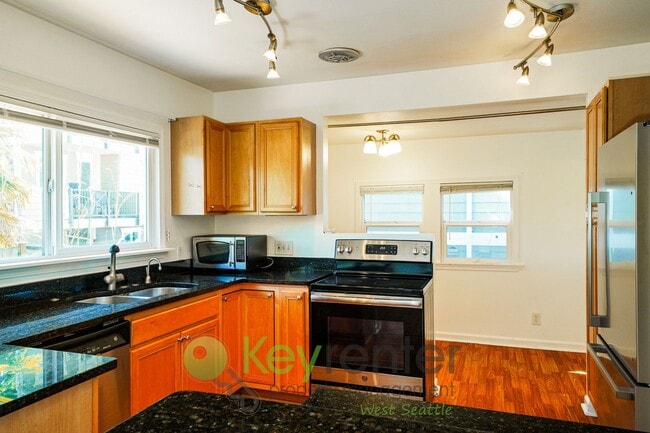 Building Photo - Spacious 4-Bedroom Seattle Home with Bonus...