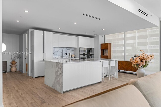 Building Photo - 10203 Collins Ave