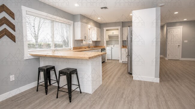 Building Photo - Renovated 3 bed 2 bath coming soon!