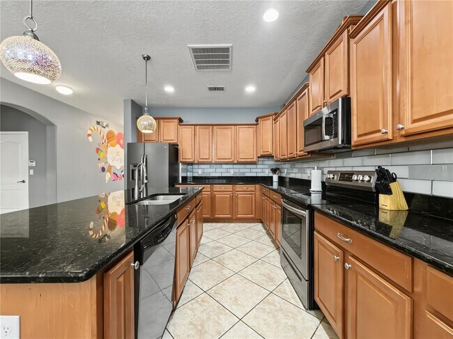 Building Photo - 8854 Candy Palm Rd