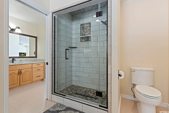 Building Photo - Beautiful home single level entry with out buildings and amazing landscaping - shorter term lease...