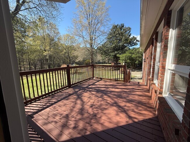 Building Photo - Spacious ranch, fenced yard, 2 car garage, large basement, near Wake Tech