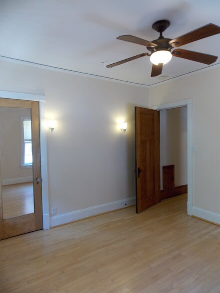 Bed 1, wall sconces, ceiling fan - 3408 N Downer Ave