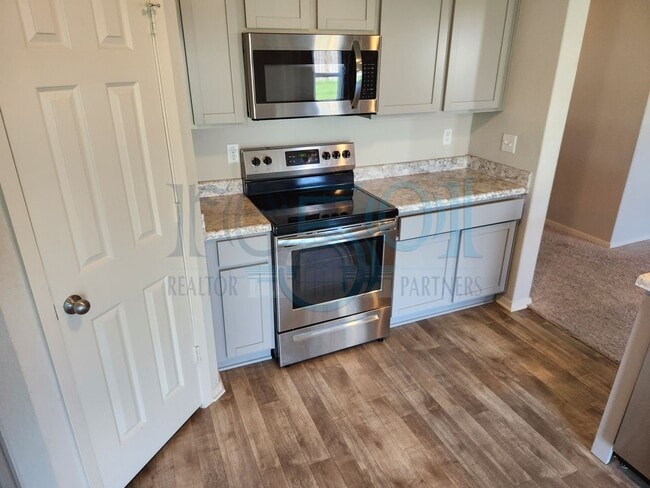 Building Photo - Modern Living in Wisteria: Contemporary 3-Bed 2-Bath Oasis Near I-430