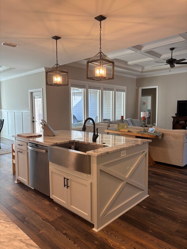 Building Photo - Spacious 4BR/3BA Creekside West Home with Screened Porch, Fenced Yard & 3-Car Garage