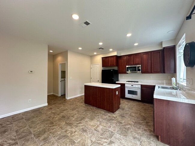 Building Photo - Three Bedroom Corner Lot Home