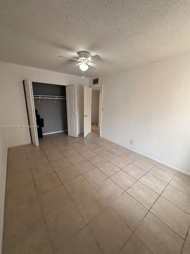 Building Photo - 5950 NW 25th Pl