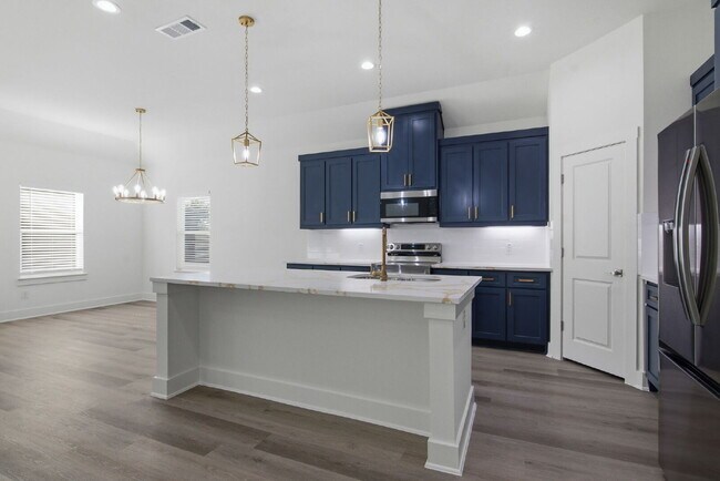 Building Photo - "New Construction 3-2-2 Home with Designer Touches Throughout!"