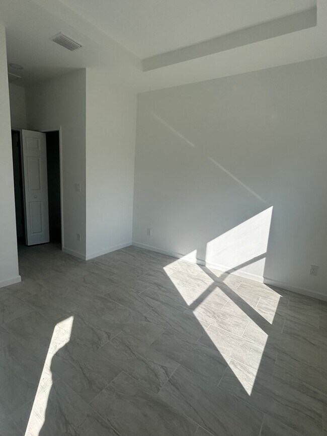 Building Photo - BRAND NEW CONSTRUCTION- 4 Bedroom 2 Bath-2 Car Garage-Serene Lake Placid Location