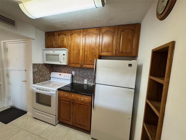 Building Photo - 10700 SW 108th Ave