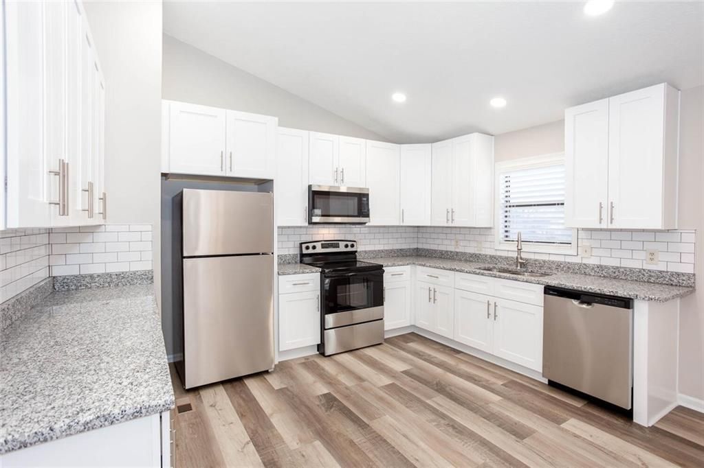 Building Photo - 4049 Leicester Dr NE