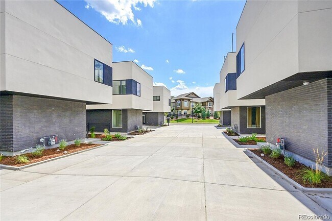 Building Photo - New Construction 3-Bedroom Townhome with Rooftop Deck & Mountain Views