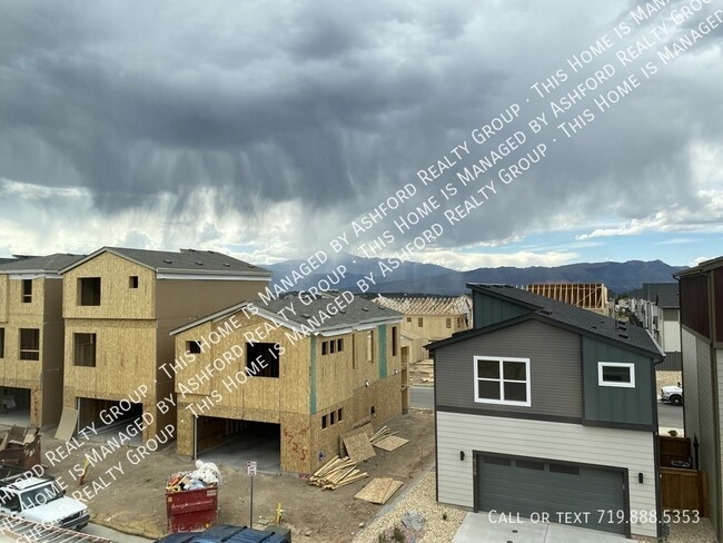 Building Photo - 6731 Lily Mountain Ln