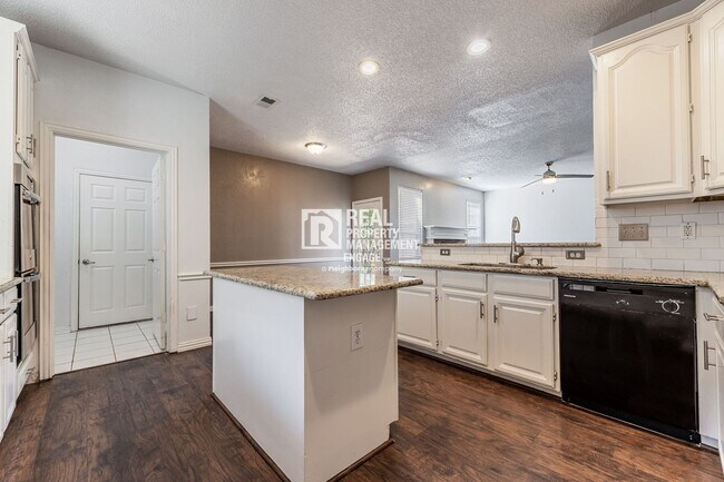 Building Photo - Recently Updated Plano Property with Modern Features and Serene Surroundings