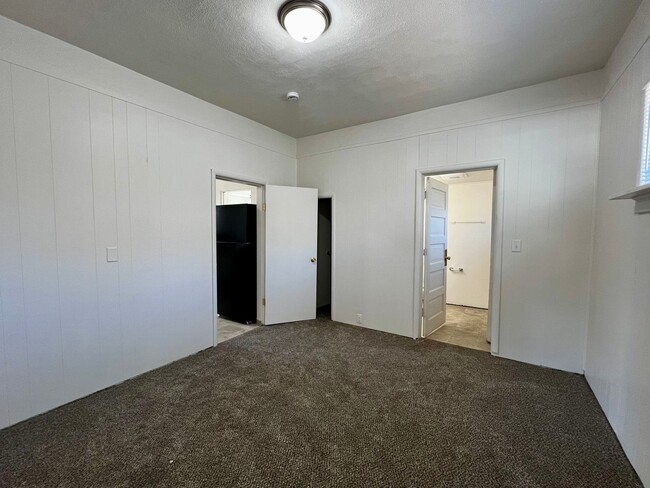 Building Photo - Non-Refundable & Security Deposit Total: $1500.00