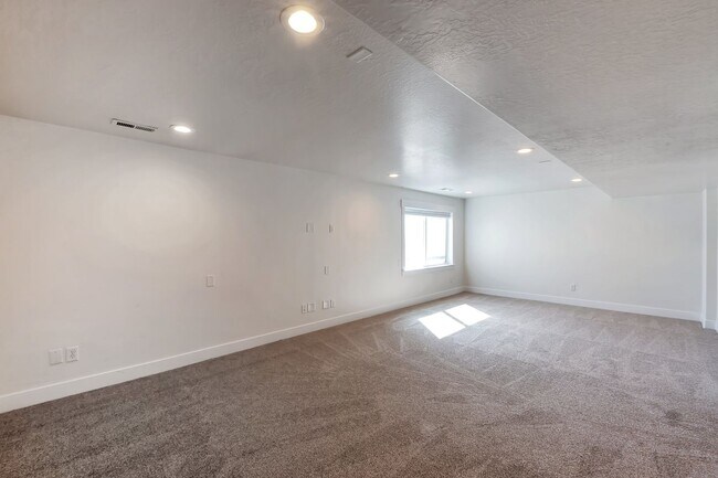 Building Photo - Modern Row End Townhome w 2 car attached g...
