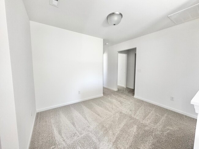 Building Photo - Four bedrooms with 2 1/2 bath with office space and loft