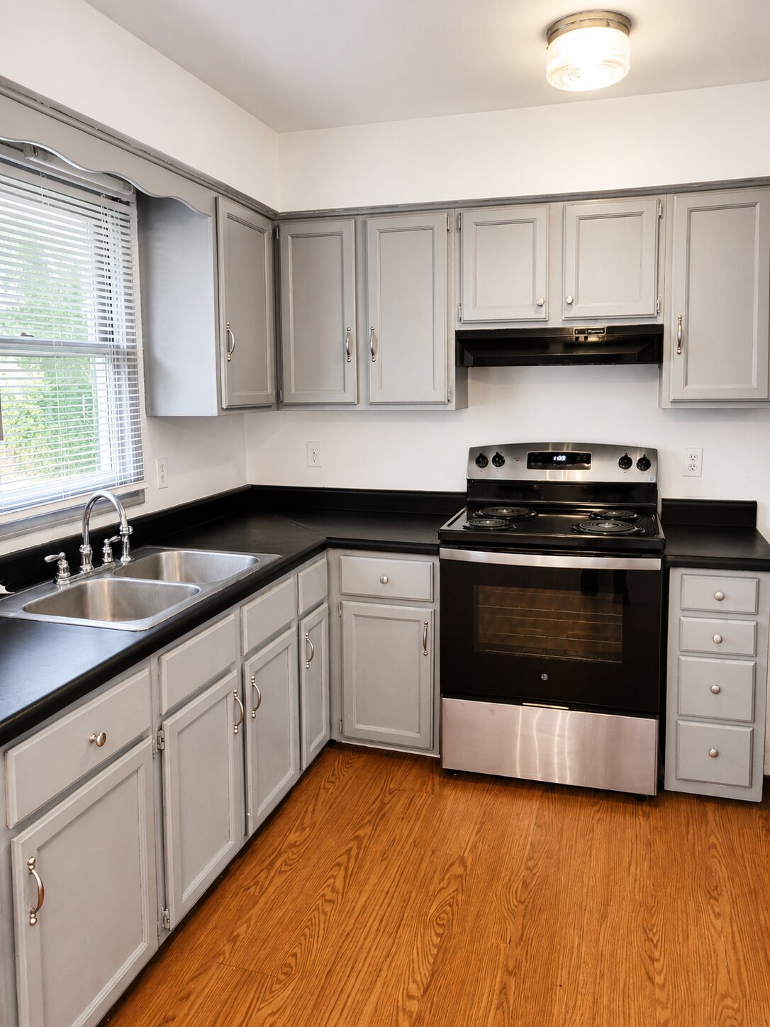 Kitchen clean and ready for your favorite recipe - 303 Rutherford Ave NW