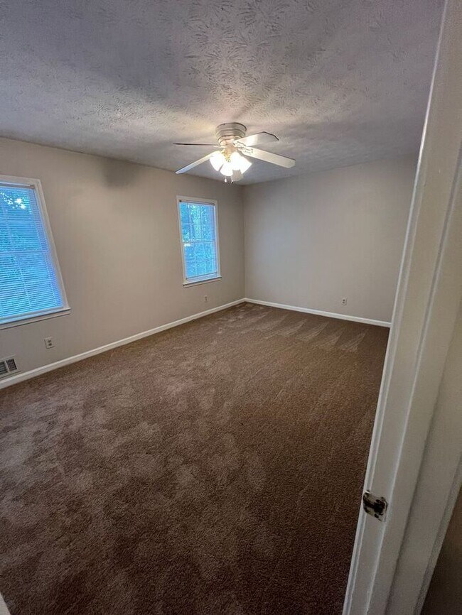 Building Photo - Finally a 2 bedroom townhome on Downing St Lawrenceville, GA