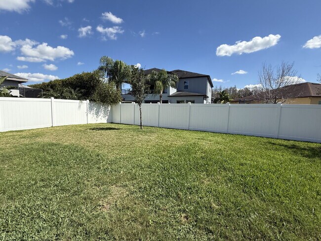 Building Photo - Spacious 4-Bedroom Retreat with additional office/den in the Heart of Trinity!