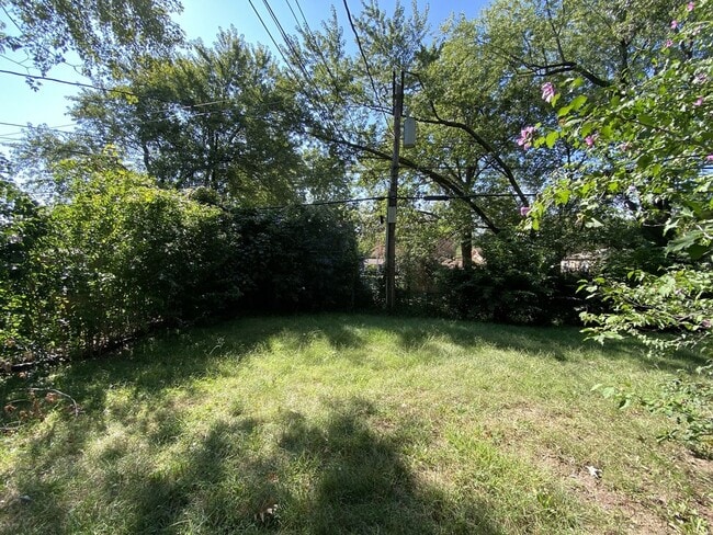 Building Photo - Corner Lot Charmer with 2-Car Garage in Ov...